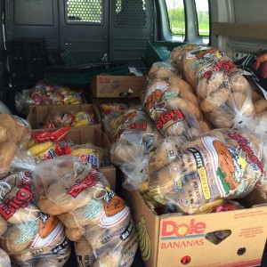 The back of GleanKY's van is filled with potatoes for the church.